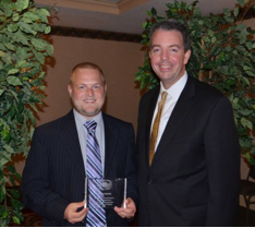 4-H Agent accepts award