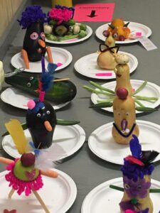 animals made from vegetables on plates
