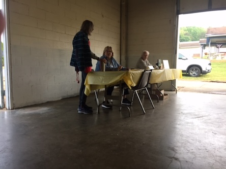 Several more volunteers working the checkout tables